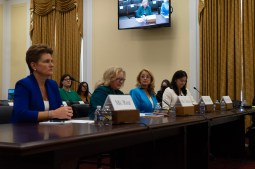 Maria Roat, Margie Graves, Suzette Kent and Erie Meyer sit at a long table in a hearing room on Capitol Hill.